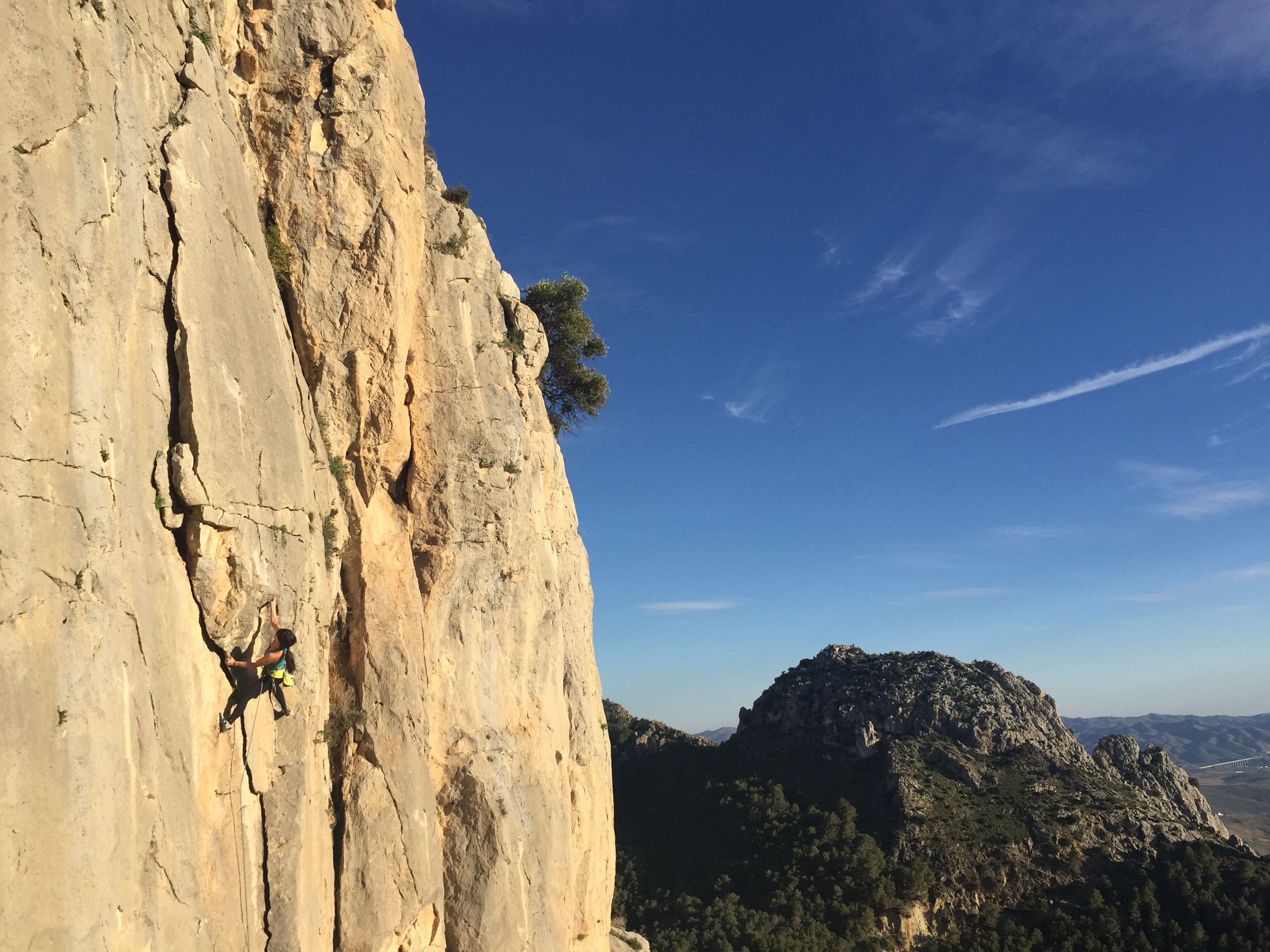 Betsy rock climbing in Spain
